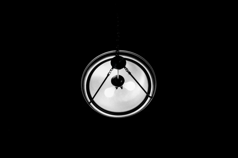 a close up s of a round light fixture