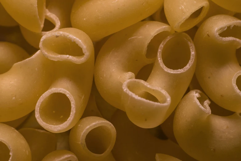 closeup of a bunch of pasta sauce with the rings still attached