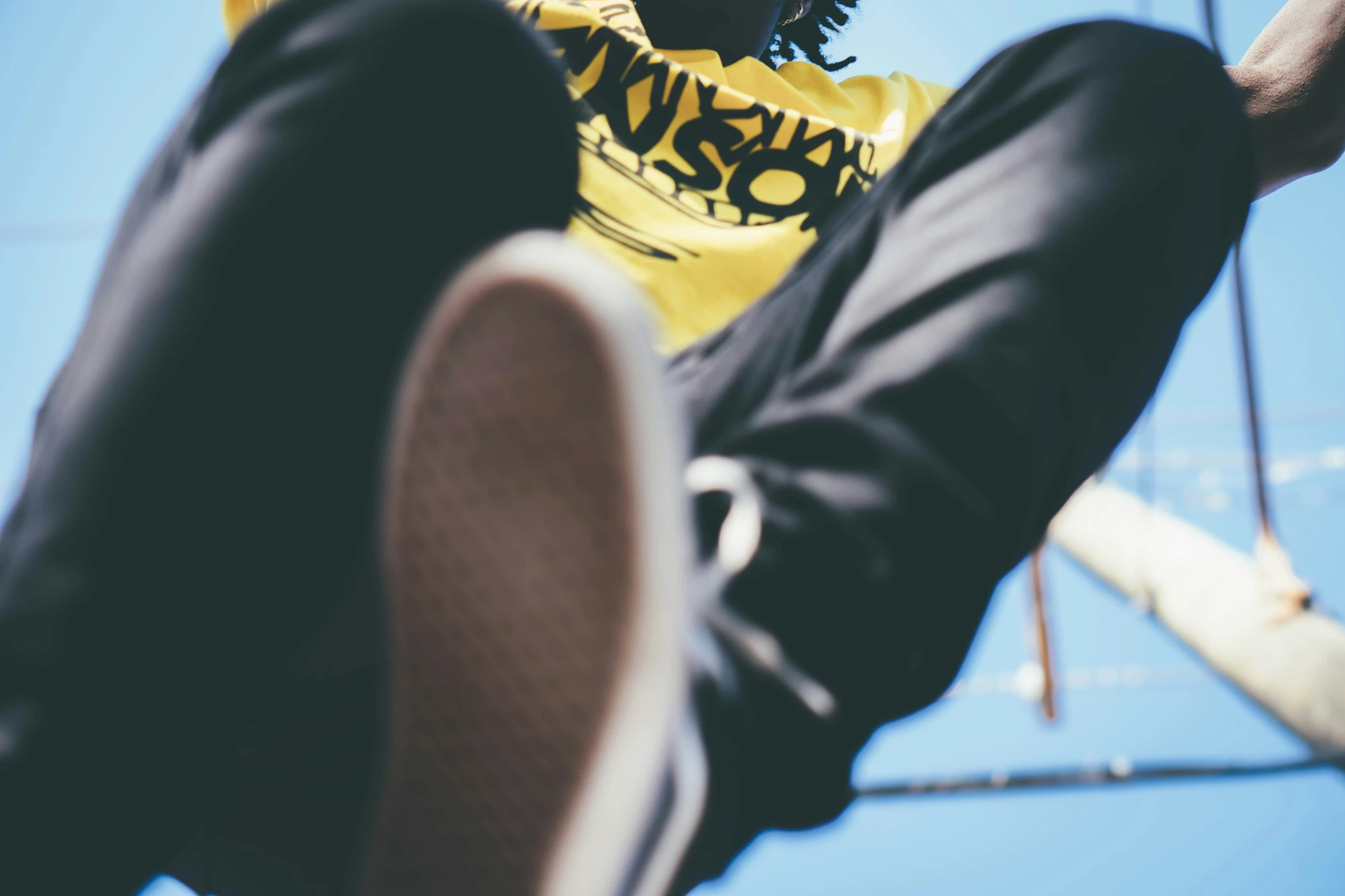 a man flying through the air while riding on top of a skateboard