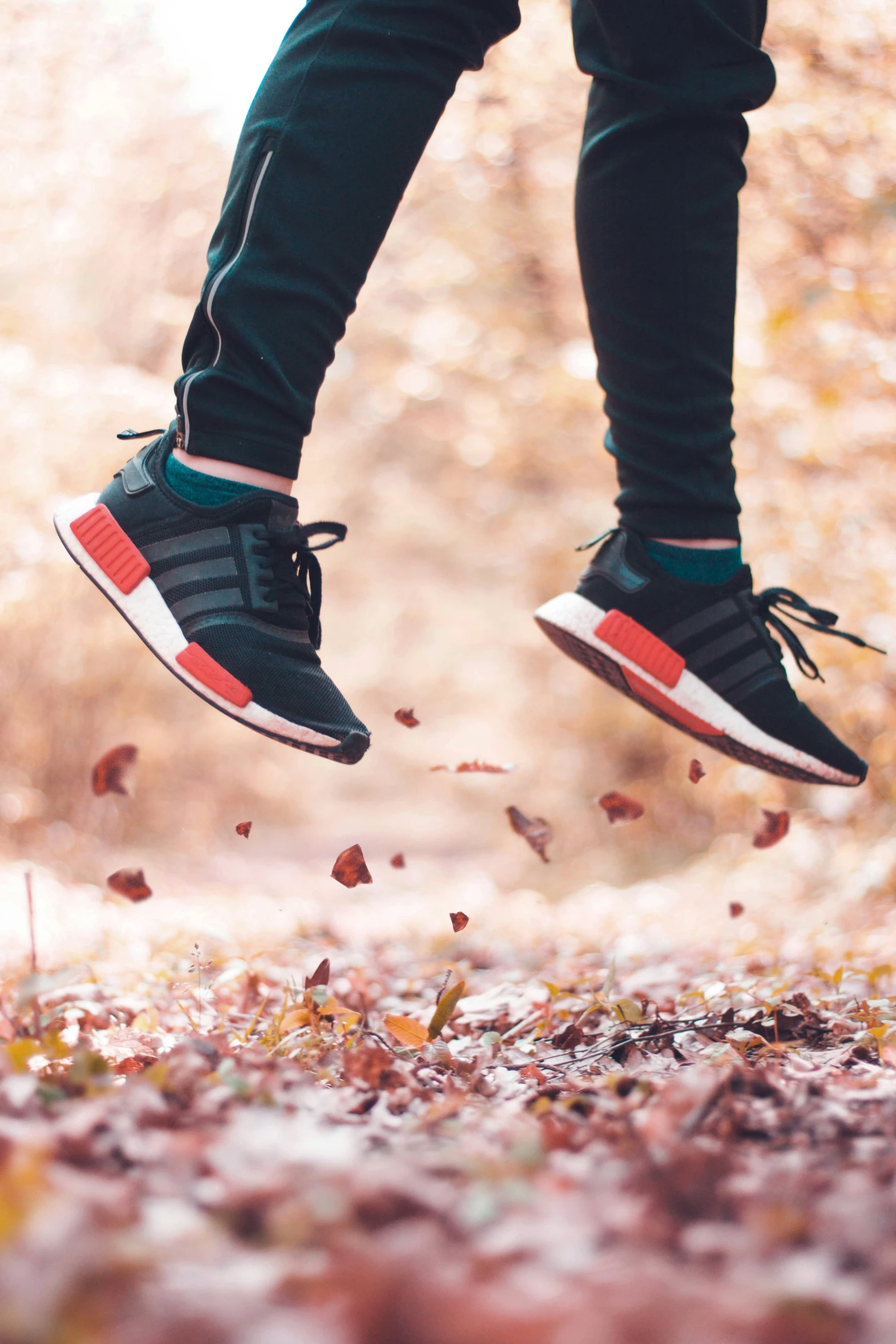 a person walking on leaves in the air