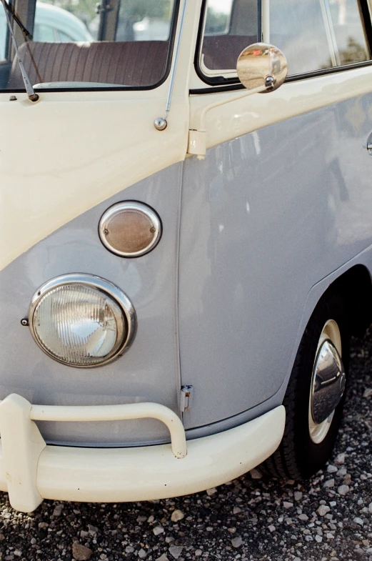 a close up view of an old fashioned white bus