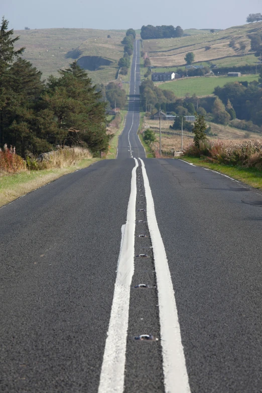 the street is lined with white strips on it