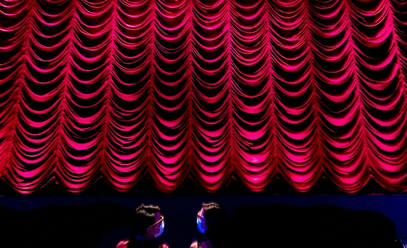 the couple is dancing together on the stage