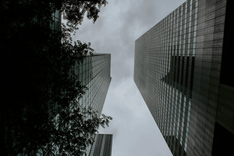 a street view looking up at tall buildings