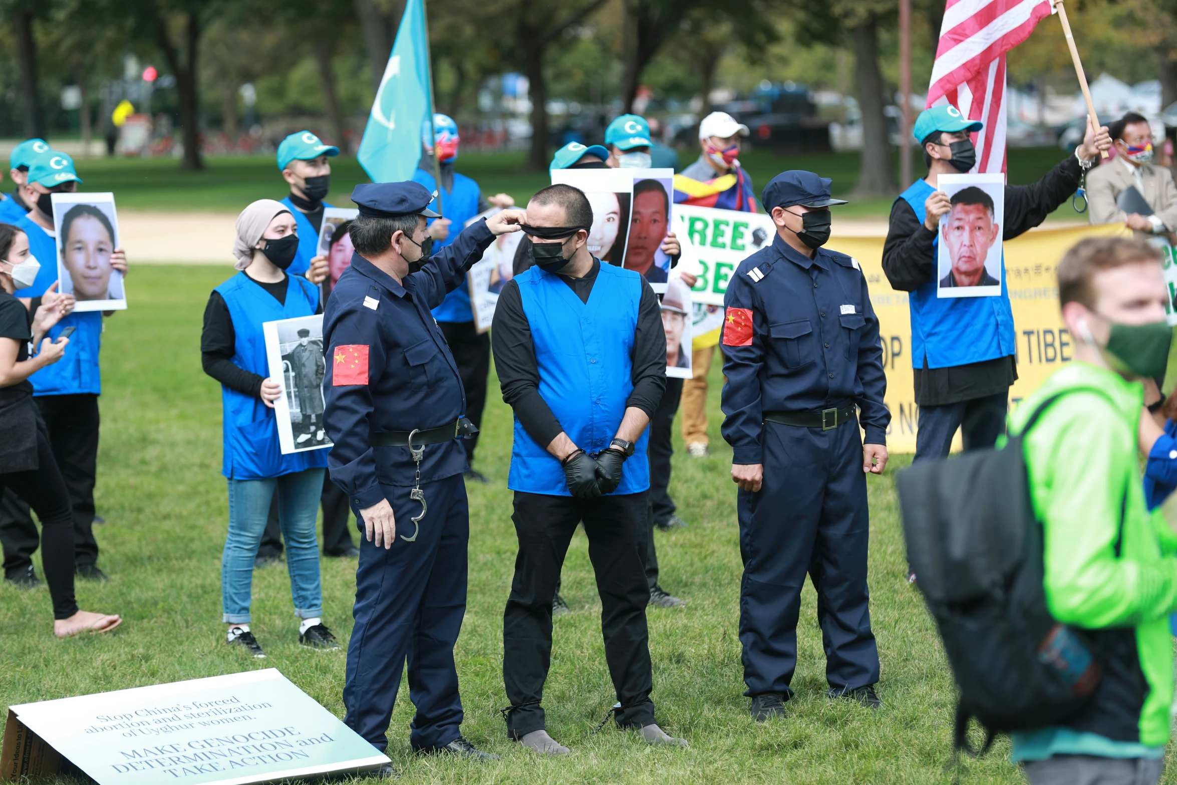 a group of cops with some signs in their hands