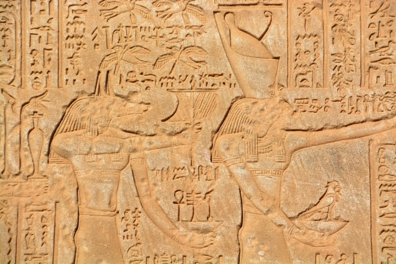 a decoratively carved bas relief of an egyptian pharaoh