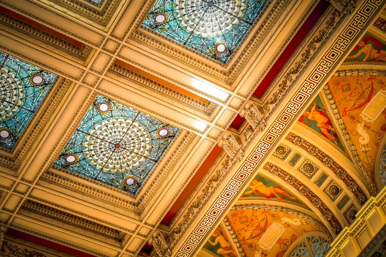 colorful stained glass in the ceiling of a building