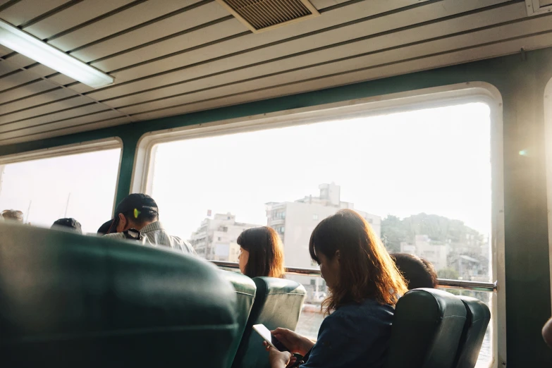 passengers in the back seat of a passenger train