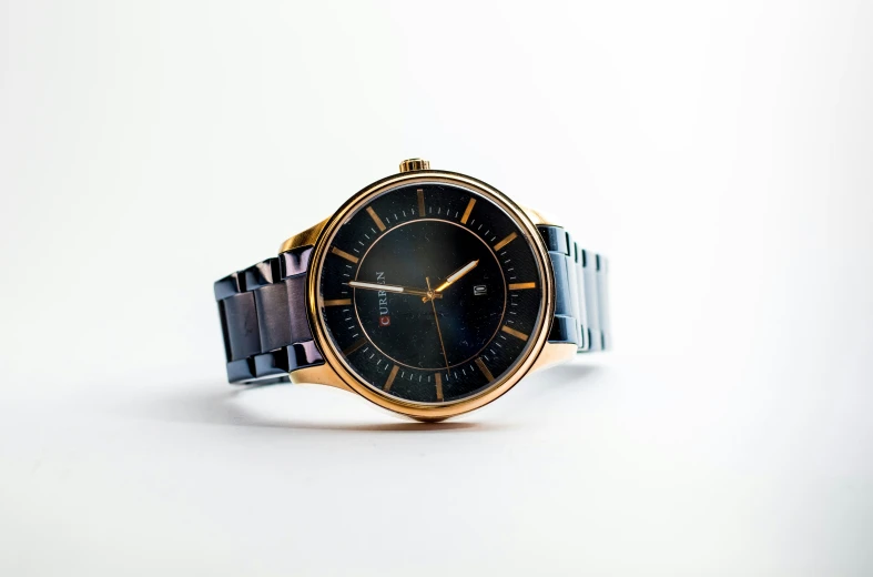 a watch with two toned metal celets