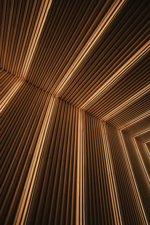 wood planks in a ceiling light up with different lights