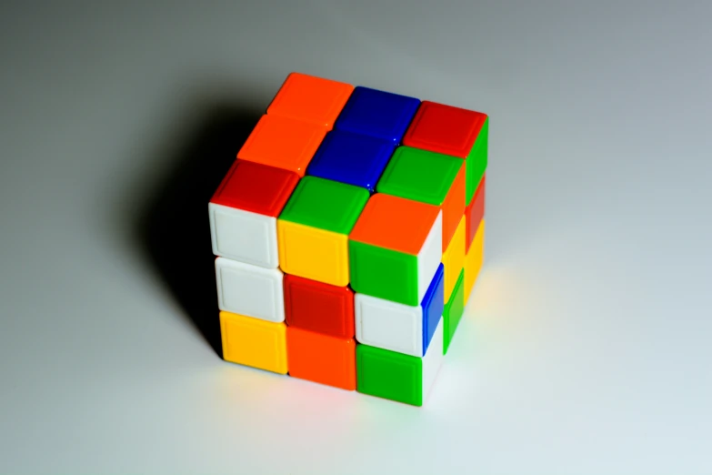 this is a colorful rubix cube on white background
