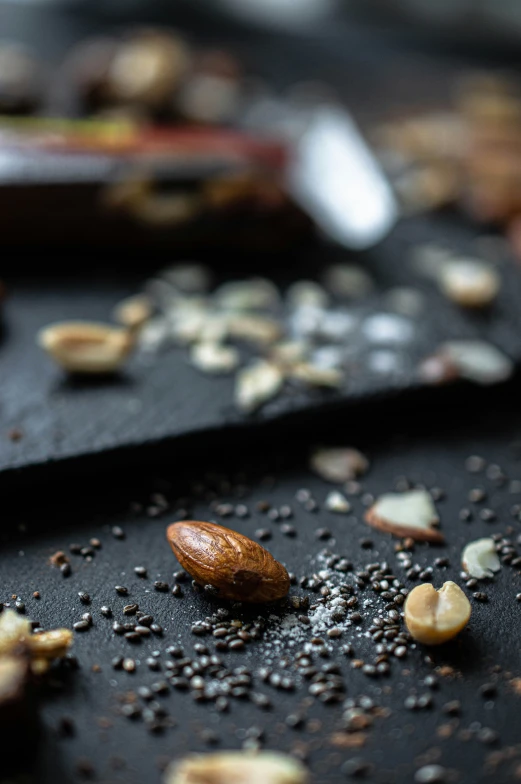 pieces of nuts and seeds on top of an old  board