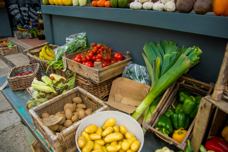 a farmers market has various fresh vegetables for sale