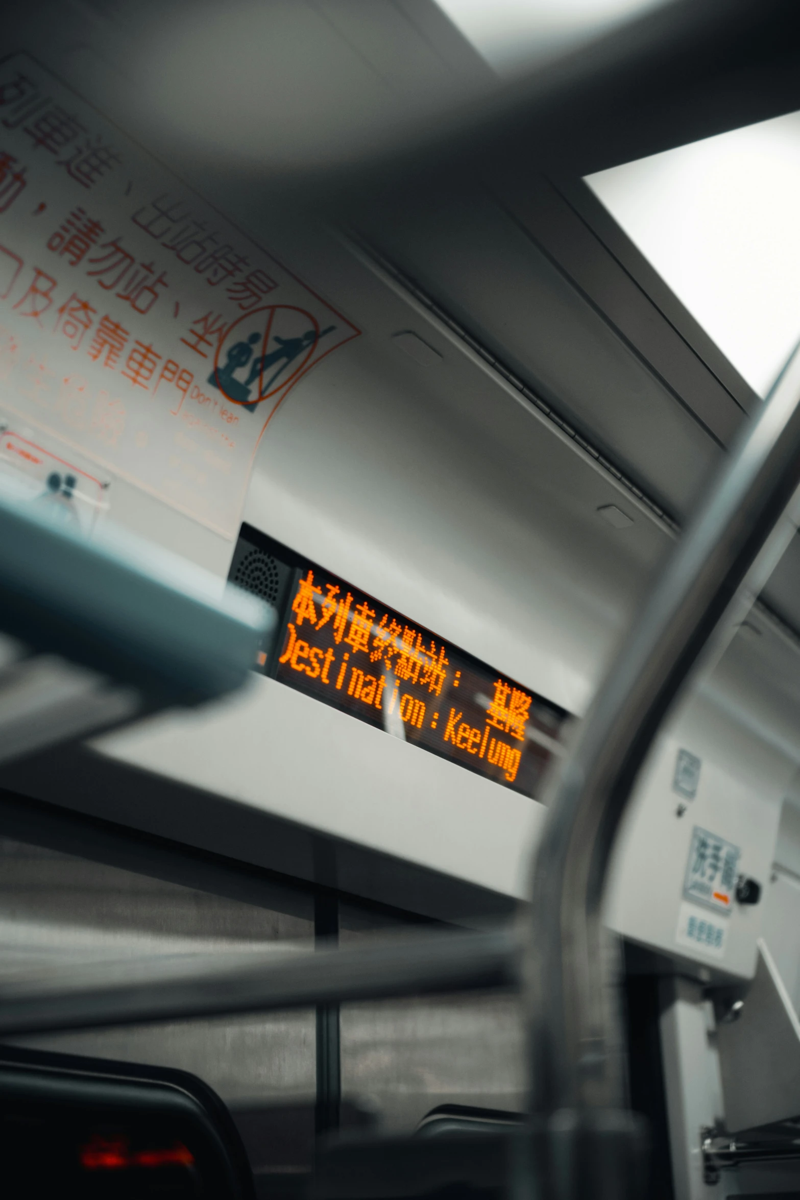 an orange sign with chinese characters on it