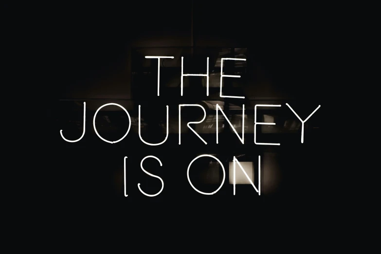 the journey is on logo with black background