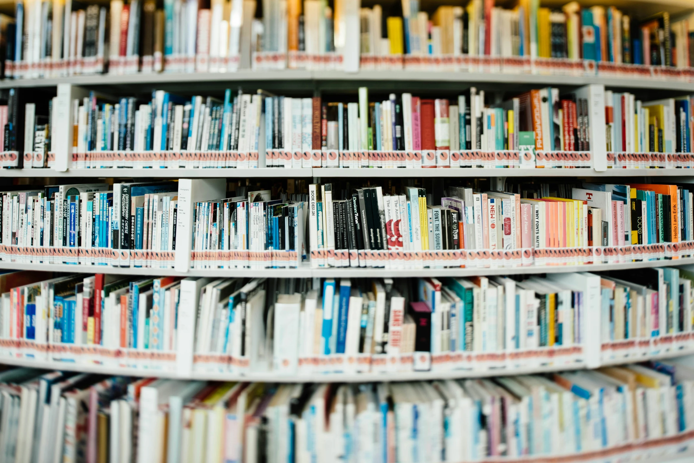 an image of books lined up in the liry