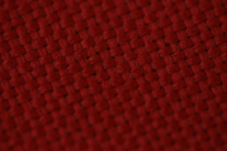 an up - close s of the color red on a fabric