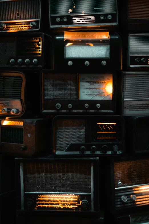 a close up of some old radio and television's