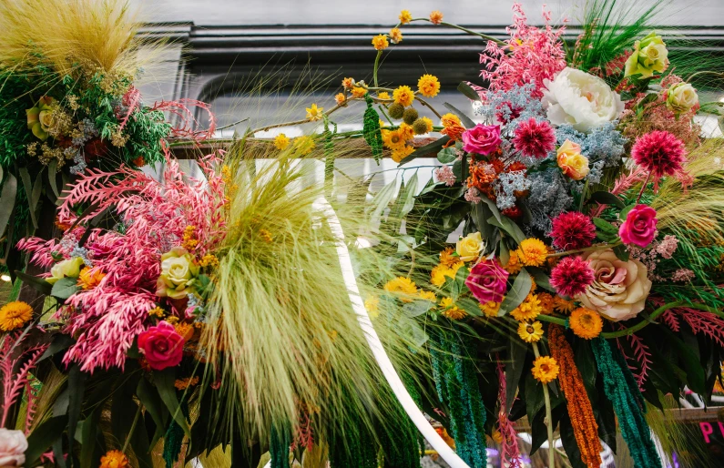 a group of fake flowers that are on the ground