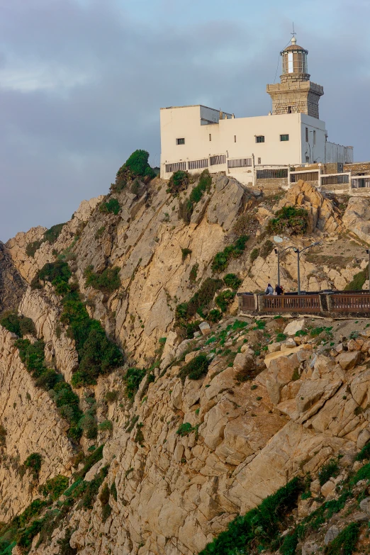 an image of a lighthouse in the cliff