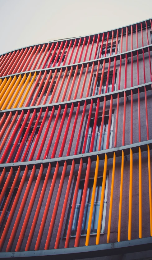 the colorful and bold facade of an apartment building
