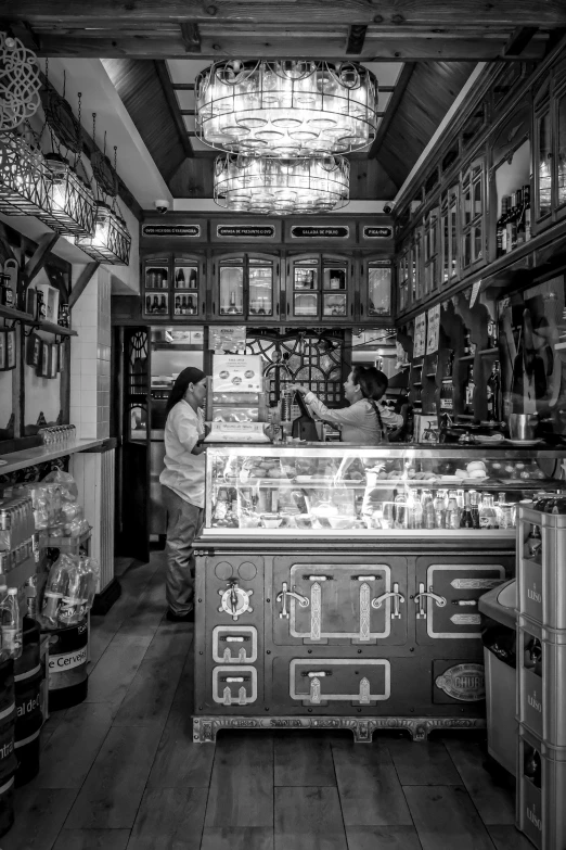 a man working at an antique jewel shop