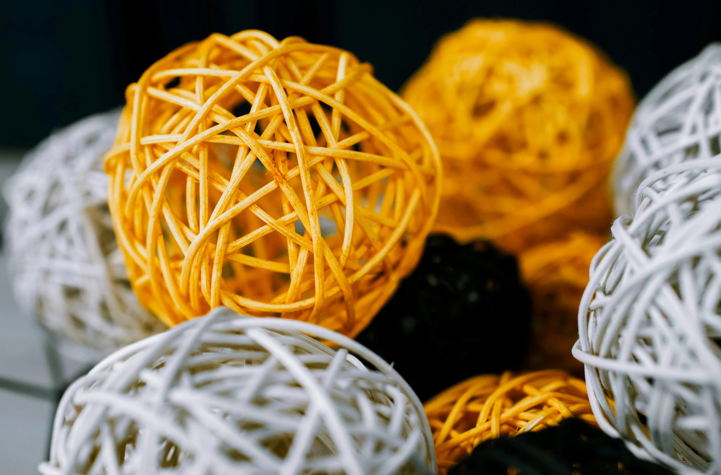 several balls that are made from a string