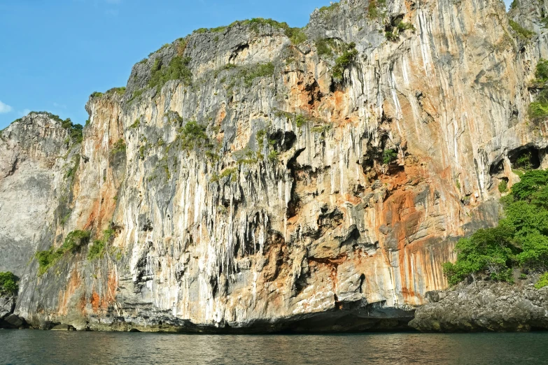 an image of a mountain side with a body of water