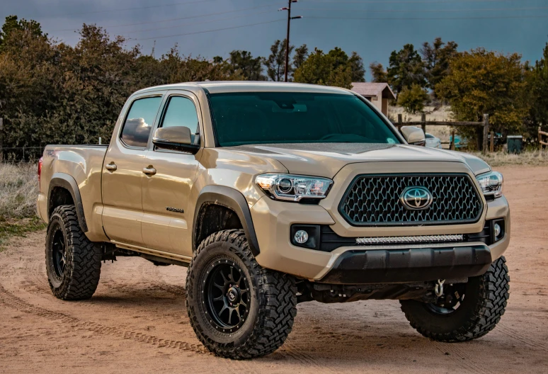 the front view of a silver toyota pickup truck