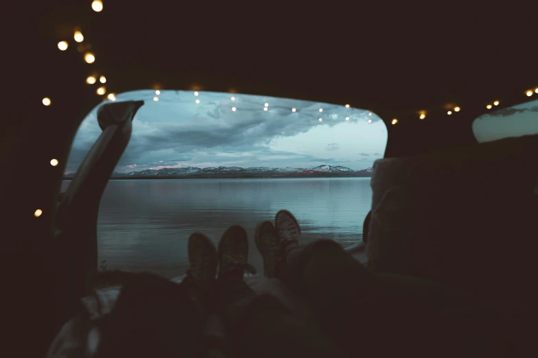 the view from a car window of the ocean and land