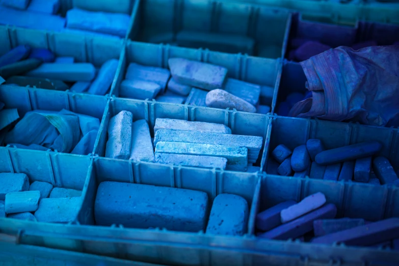 many different colors and shapes of soap with rocks