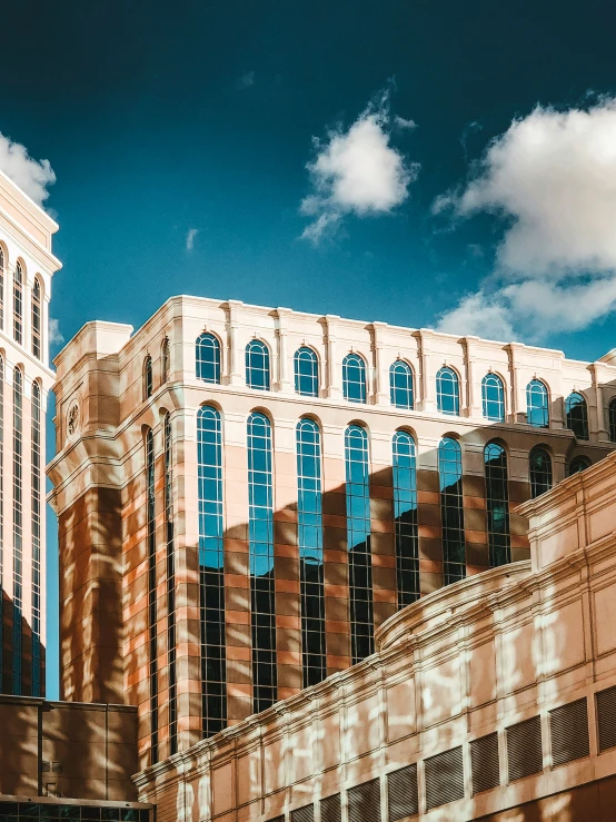 the large building has four windows and is made up of brick