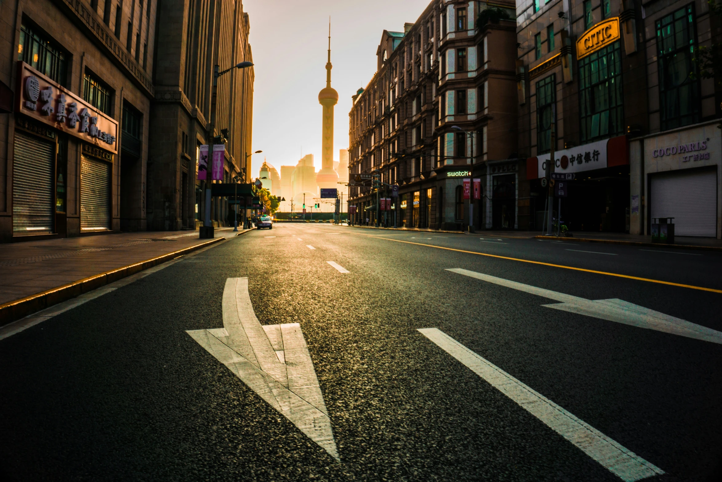 empty street with few buildings in the background