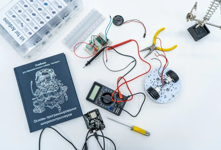 a machine with electronic components is lying on the ground