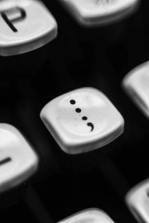 the keys of a black and white keyboard