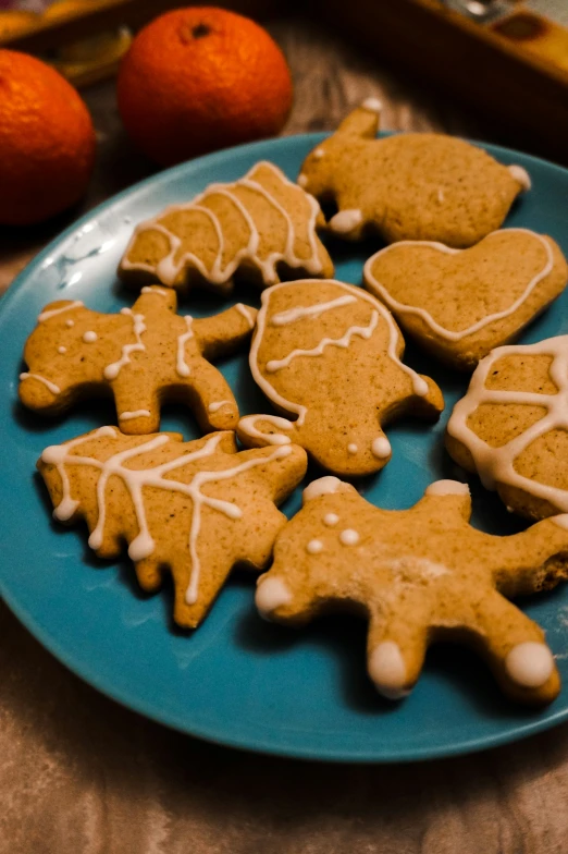 small round and round ginger cut cookies on blue plate