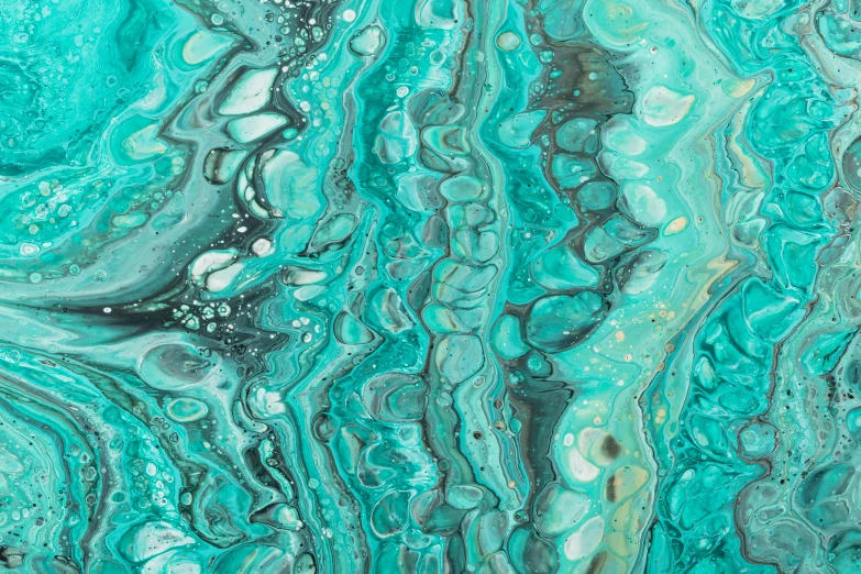 a marbled green and blue liquid or watercolor painting