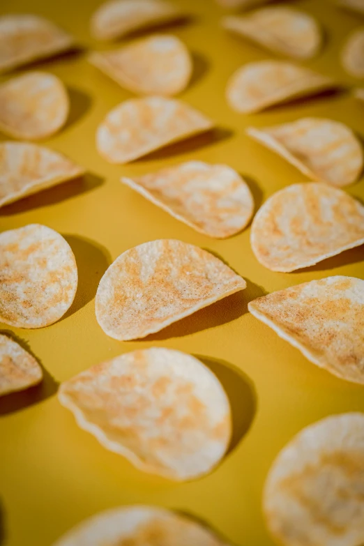 pieces of food sitting on top of a yellow surface