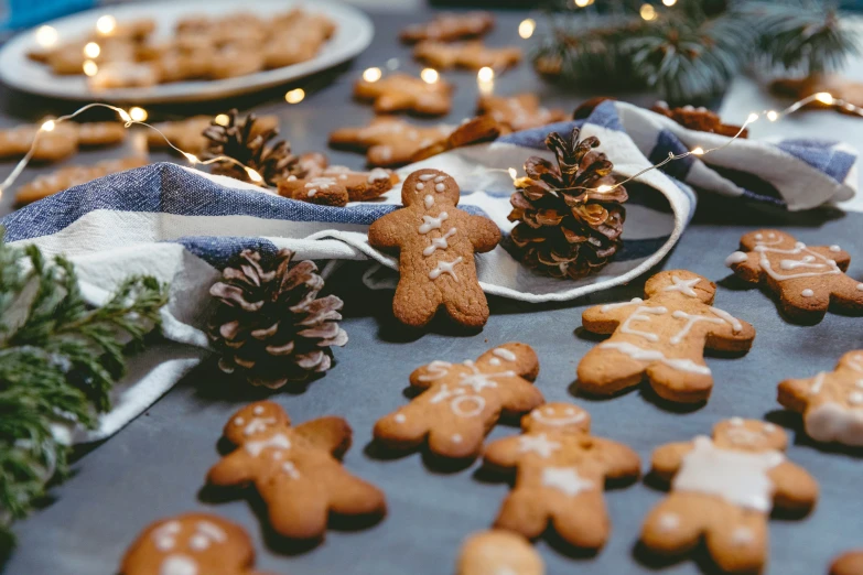 christmas cookies with decorations are shown on a table