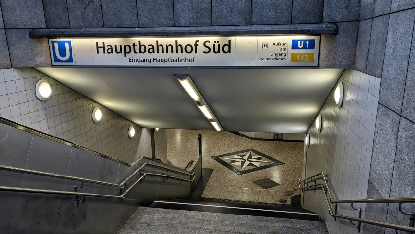 an escalator leads to an underground terminal