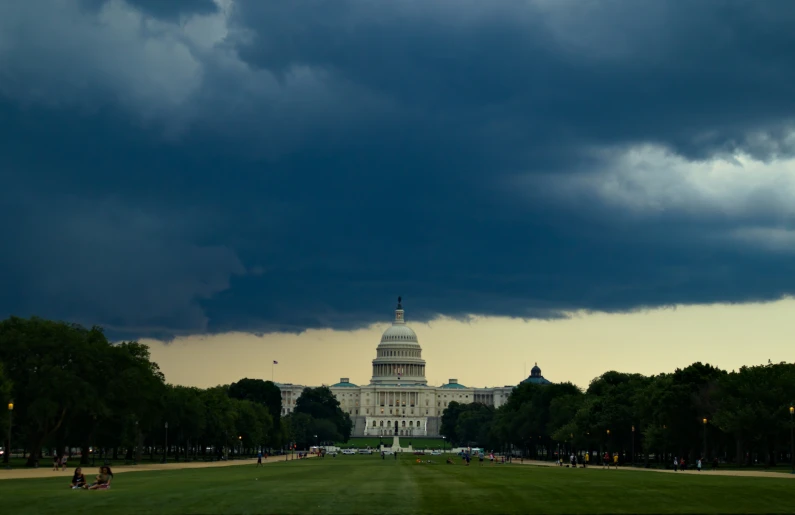 this po shows the capitol building under storm clouds