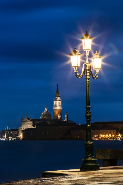 a street light near a body of water