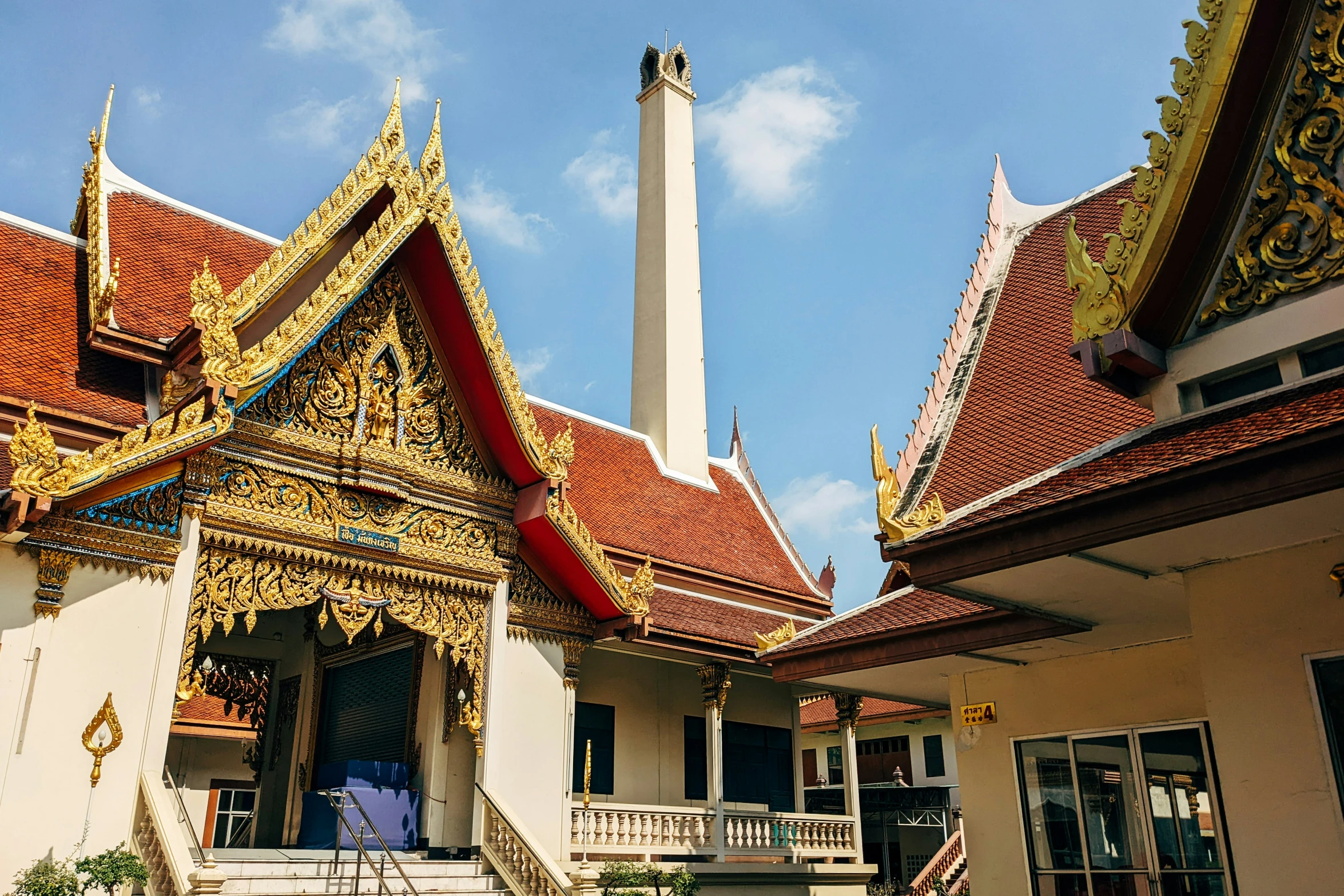 two old buildings with tiled roof and red tiles