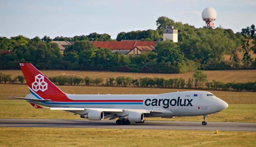 a large passenger jet taking off from an airport runway