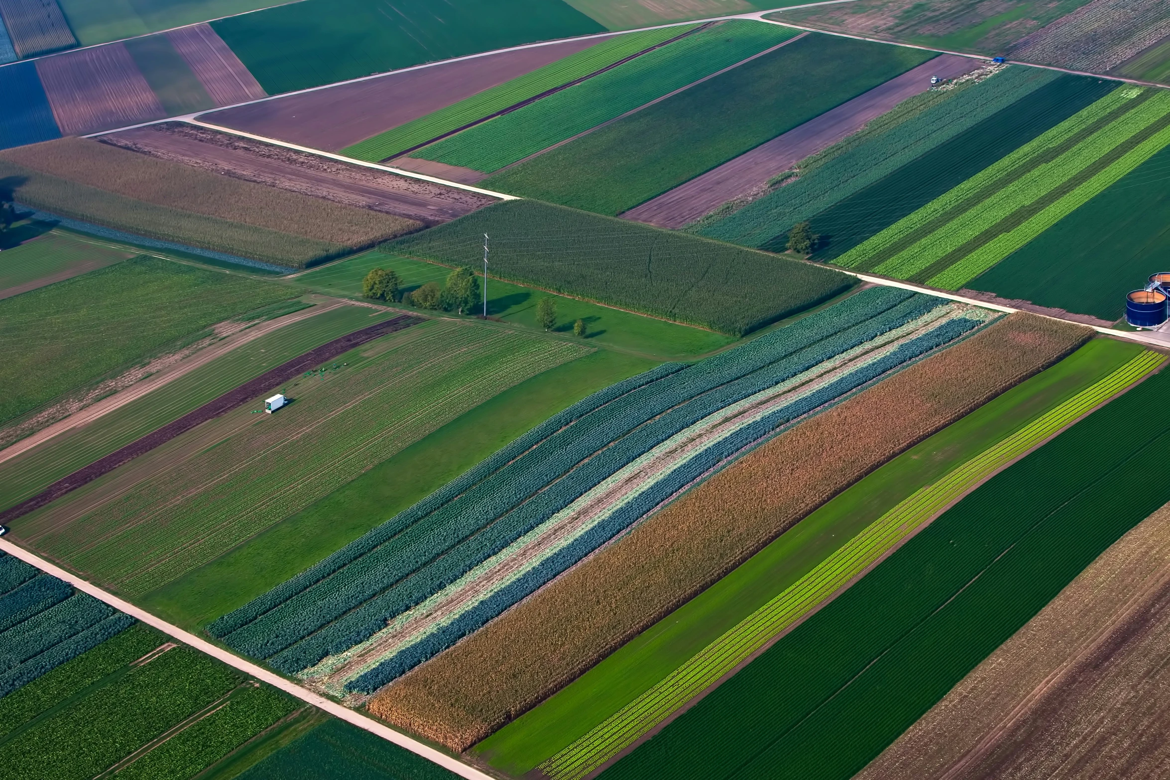 a view from the sky of farm land in the country side