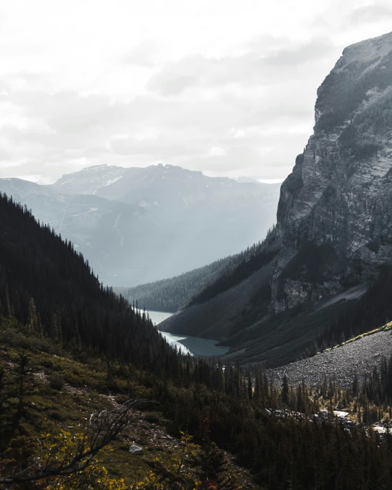 a man walks up a cliff into the distance