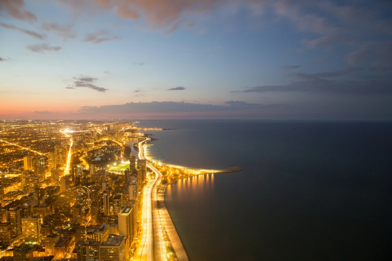 view of city lights lit up at night