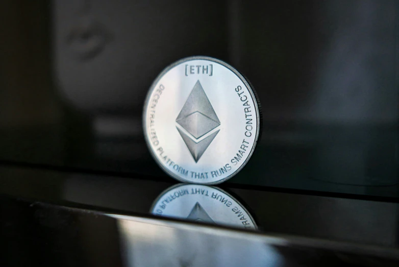 a silver coin that is sitting on a counter