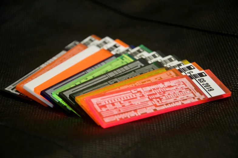 a stack of ticket's on a black cloth