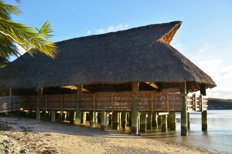 this is an image of a hut by the ocean